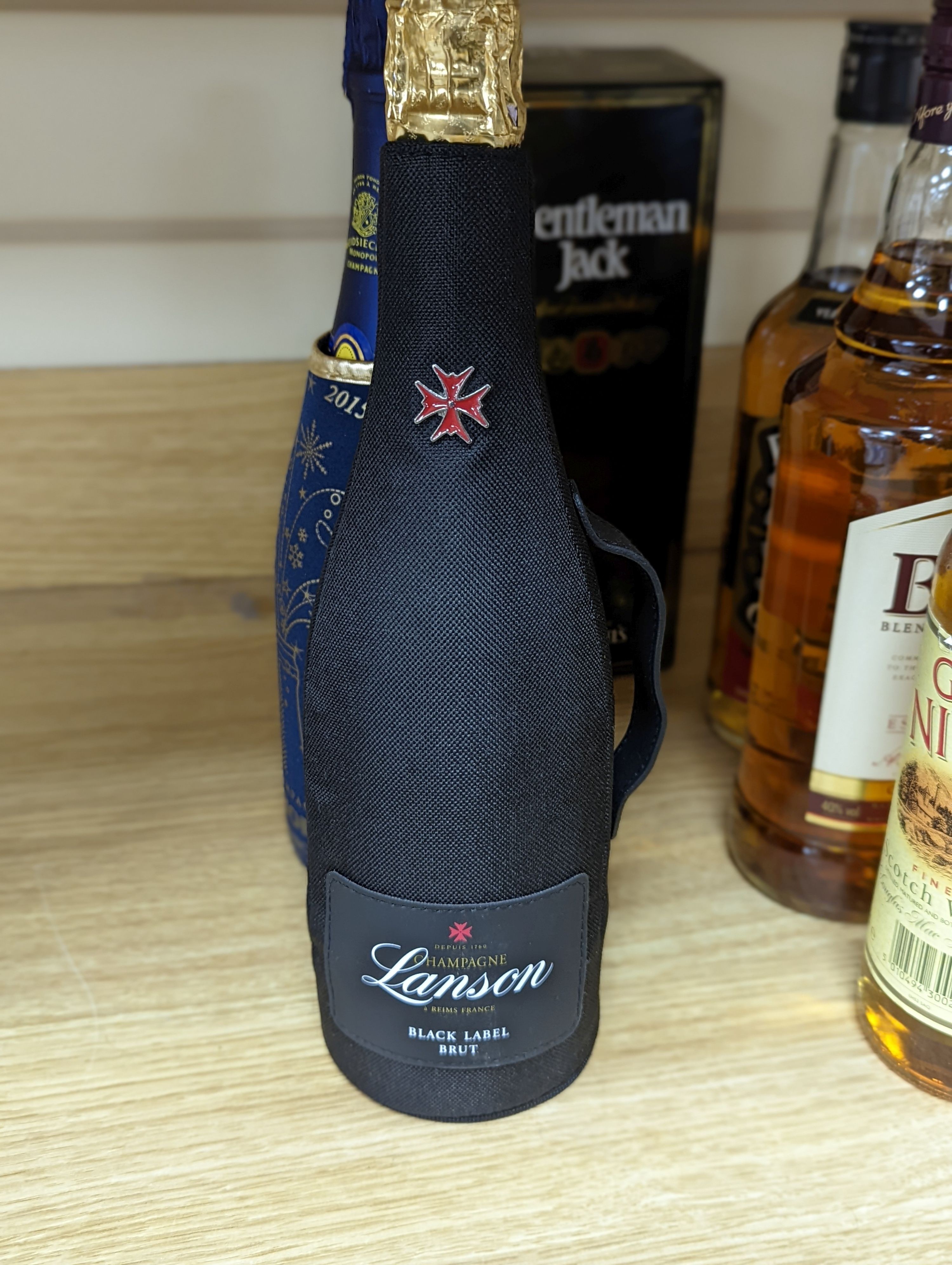 A collection of various whiskies and champagnes (12 bottles)